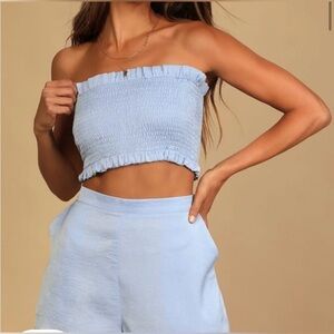 Brand New, Never Worn, Matching Blue Set.  Top is Small, Bottoms are Medium.